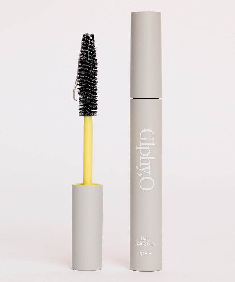 GLPHYO Hair Fixing Cara 12g de la marque GLPHYO, avec mascara et brosse sur fond clair, produit en gros plan.