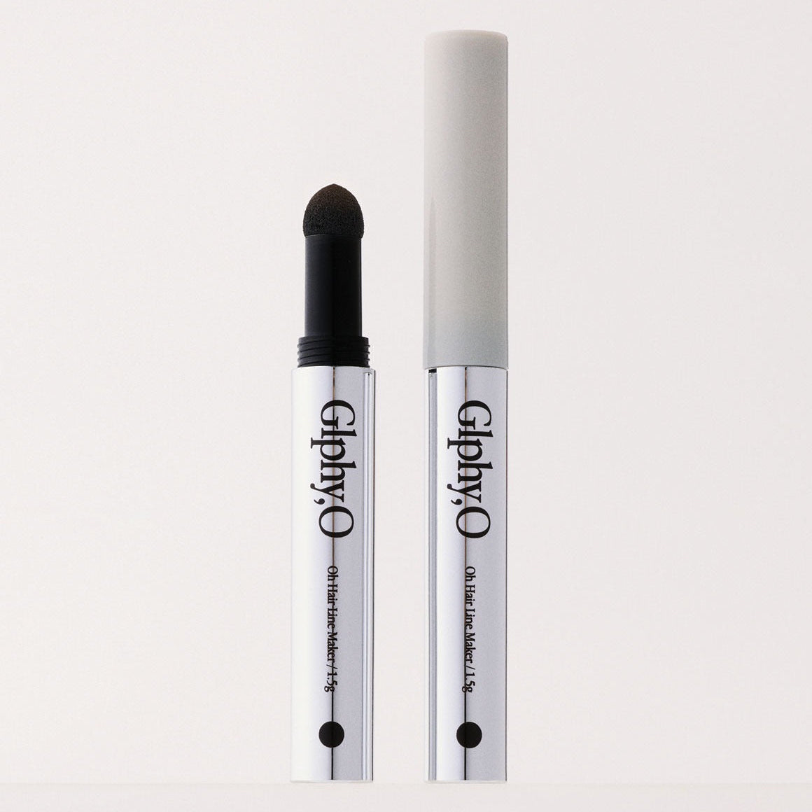 Décris l'image en français : GLPHYO Hairline Maker 1.5g de la marque GLPHYO, applicateur en gros plan sur fond clair.