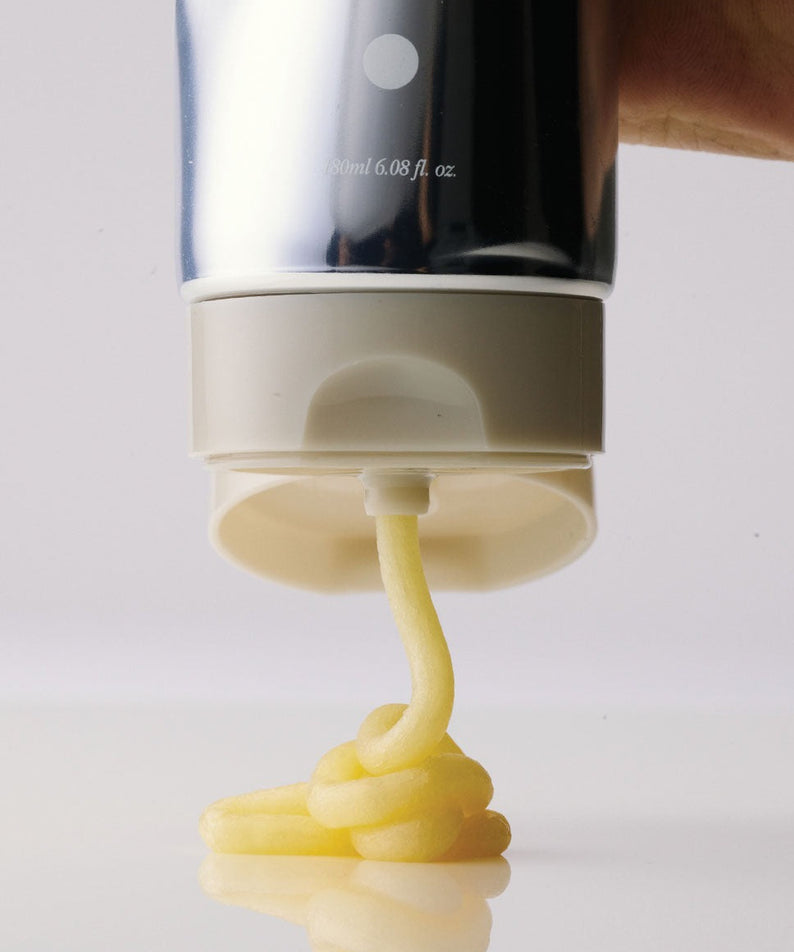 GLPHYO Oh Yellow Nourishing Punch Treatment 180ml, tube crème jaune de la marque, texture nourrissante à l’image.
