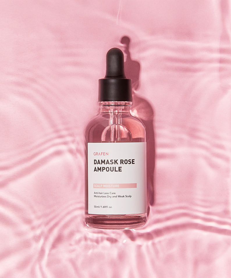 GRAFEN  Damask Rose Ampoule 50ml : flacon sérum rosé sur tissu rose, fond damassé, marque GRAFEN