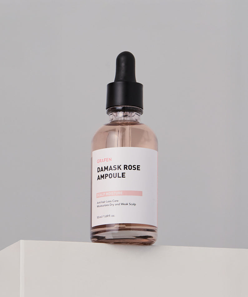 GRAFEN  Damask Rose Ampoule 50ml : flacon sérum rose sur fond clair, mise en scène cosmétique minimaliste.
