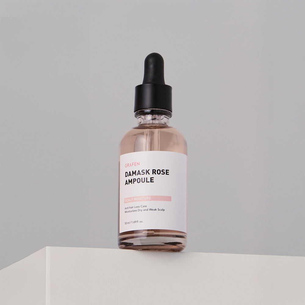 GRAFEN  Damask Rose Ampoule 50ml : flacon sérum rose sur fond clair, mise en scène cosmétique minimaliste.