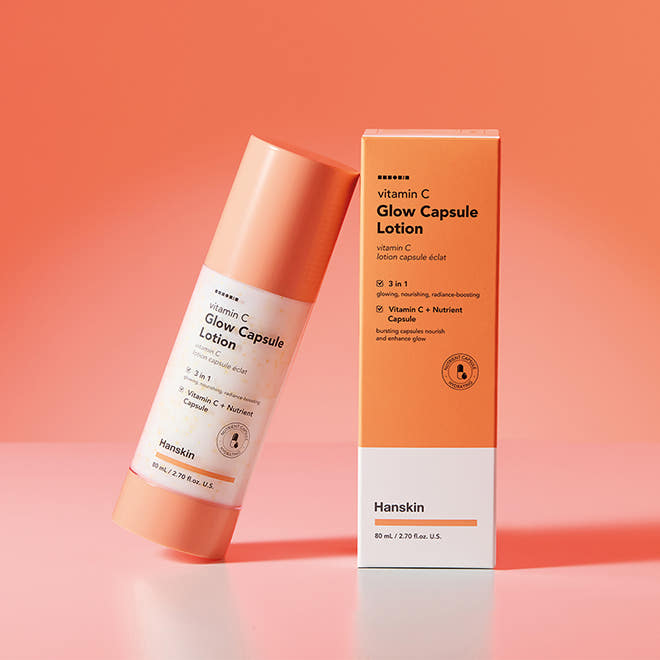 HANSKIN Vitamin C Glow Capsule Lotion 80ml, flacon et boîte sur fond orange, marque HANSKIN, visuel produit soin visage.