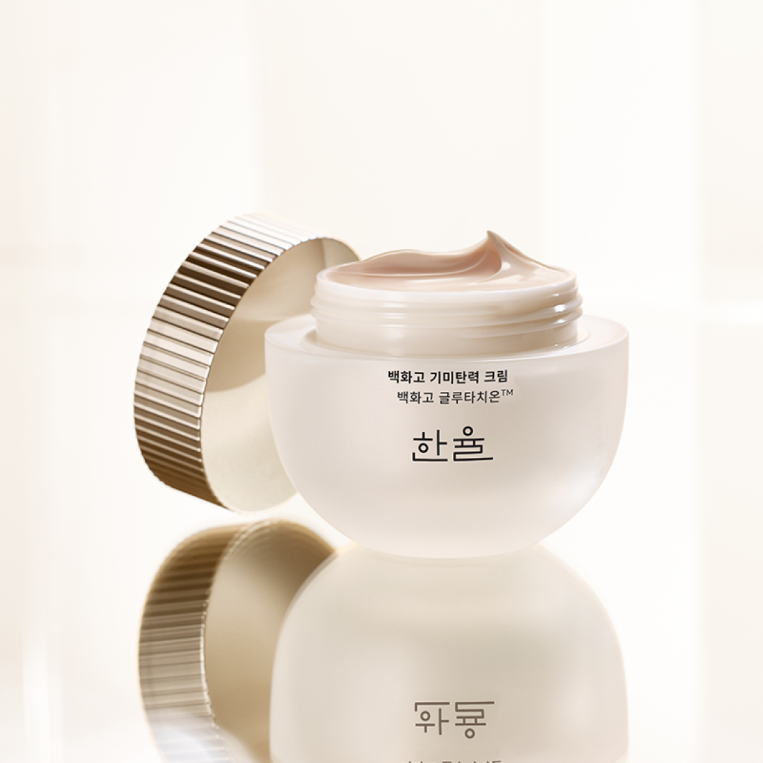 HANYUL Baekhwago Gimitanryuk Cream 60ml : crème de la marque HANYUL, pot blanc sur fond clair minimaliste.