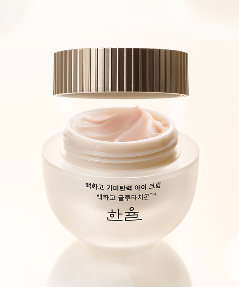 HANYUL Baekhwago Gimitanryuk Eye Cream 25ml : pot crème contour yeux rose, fond clair, branding HANYUL en gros plan