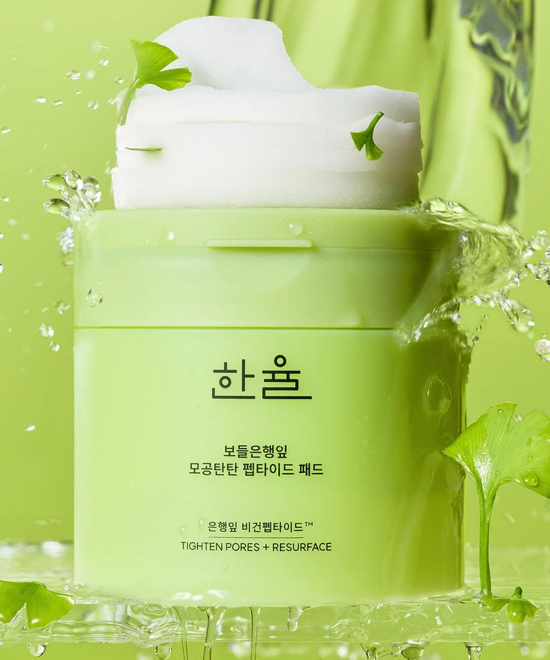 HANYUL Bodeunhaengip Pore Elasticity Peptide Pads 60 Sheets 100ml, boîte sur fond vert éclaboussures, contexte spa beauté