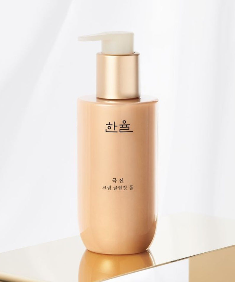 HANYUL Extreme Cream Cleansing Foam 200ml sur fond blanc élégant, flacon pompe doré, beauté coréenne, soin quotidien, mousse nettoyante