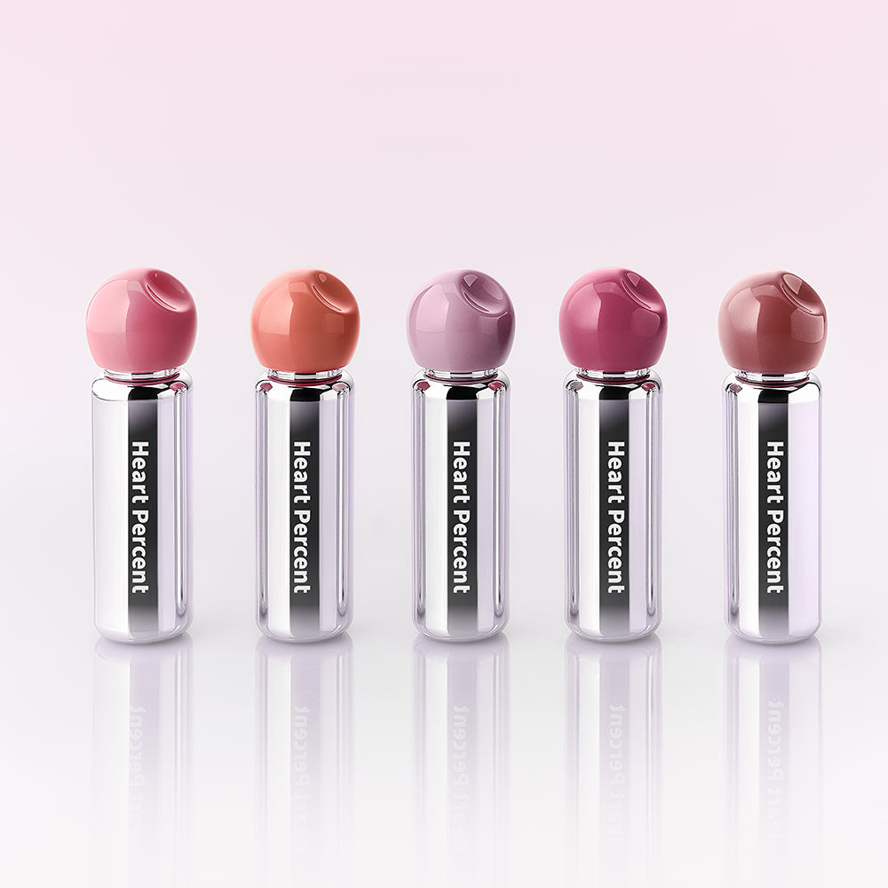 HEART PERCENT Dot On Mood First Tint 3.4g, visuels sur fond clair avec tubes et bouchons colorés.