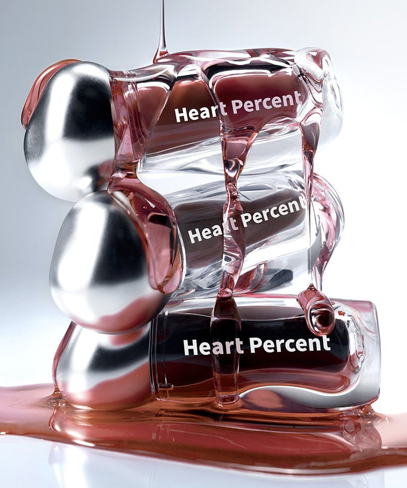 HEART PERCENT Dot On Mood Over Melting Gloss, en cœur de gloss rouge, marque HEART PERCENT, fond blanc visuel.