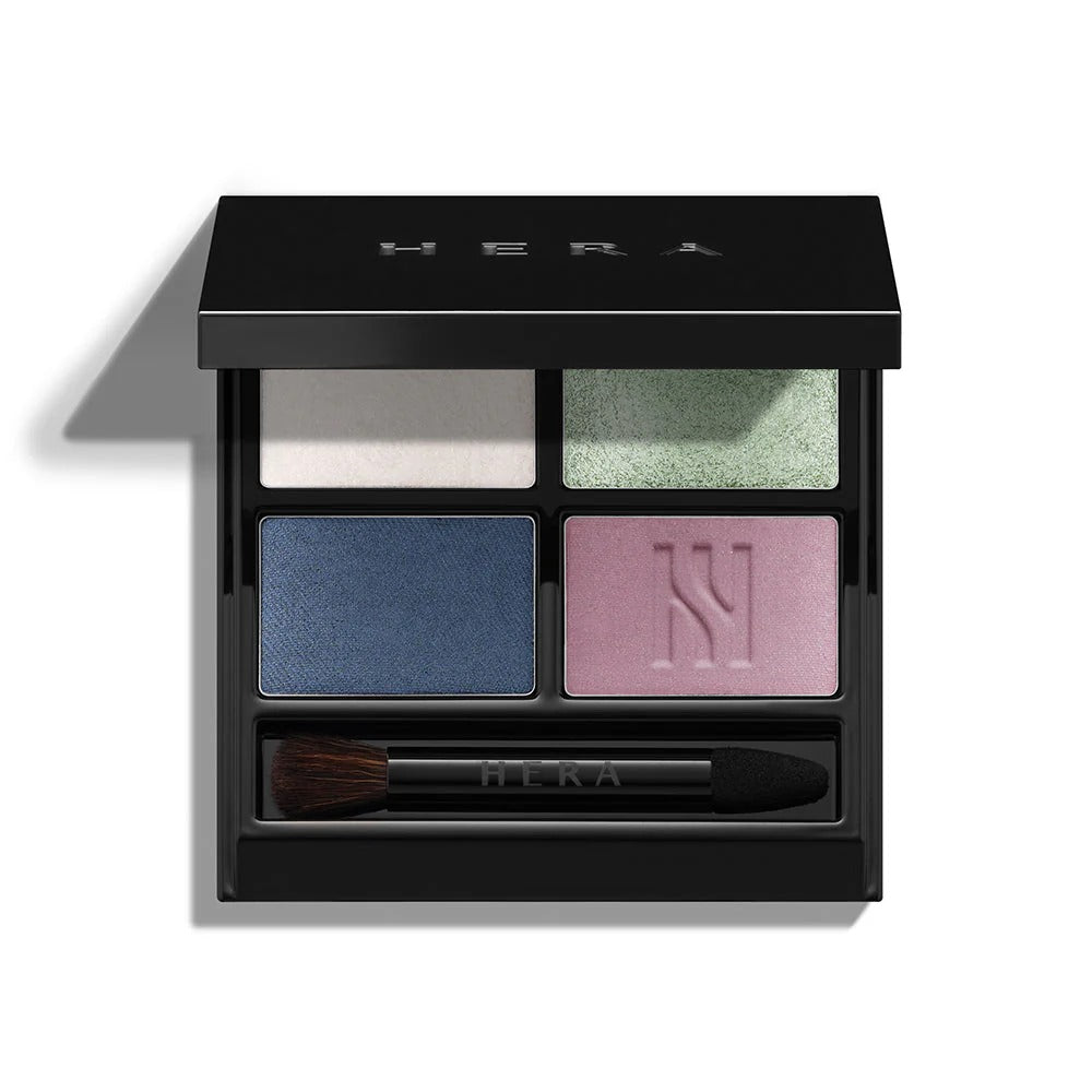 HERA Quad Eye Color de la marque HERA : palette maquillage yeux quadri avec fards bleu, vert et rose, packaging noir.