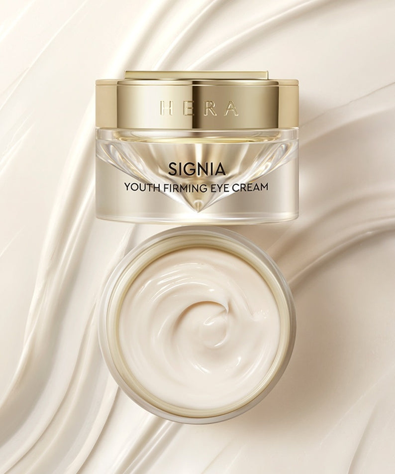 Décris l'image en français en mentionnant le produit, la marque et le contexte visuel : HERA Signa Youth Firming Eye Cream 30ml, pot crème.