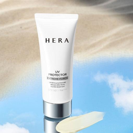 HERA UV Protector Extreme-Force Leports SPF50+PA++++ tube blanc, crème solaire sur ciel et soleil, visuel produit HERA.