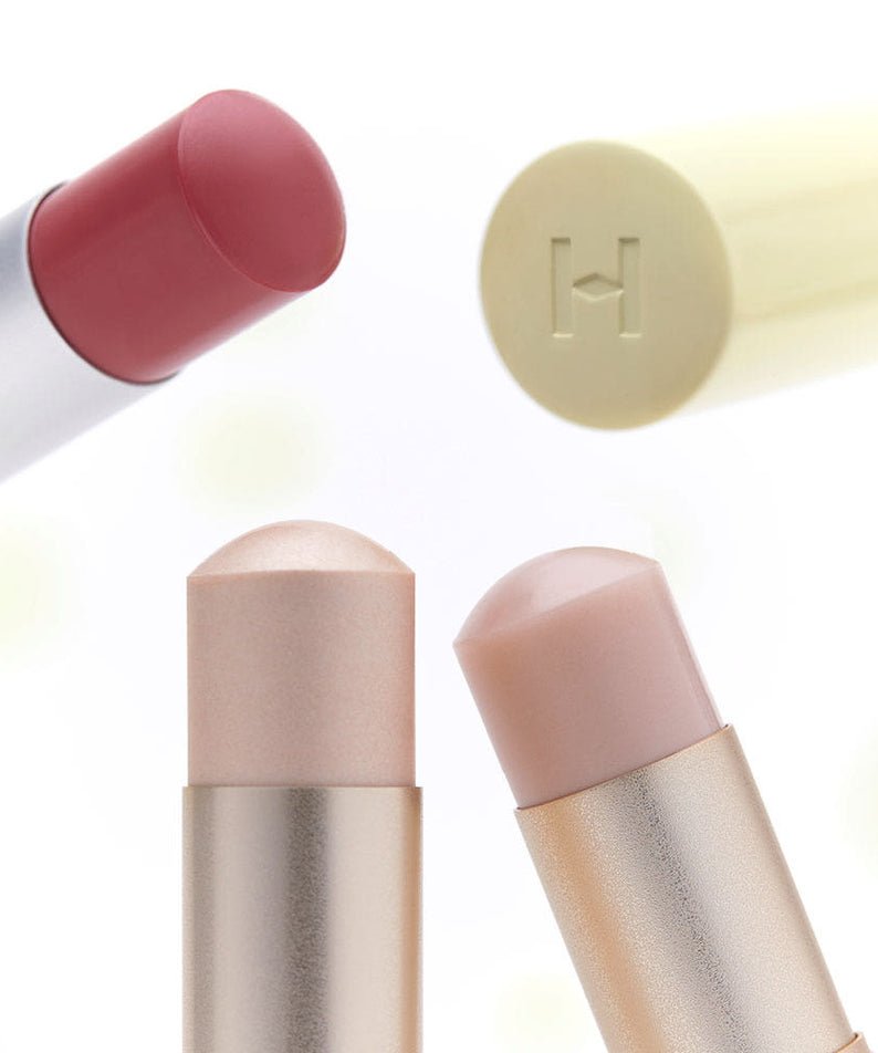 HINCE True Dimension Radiance Balm 10g, baume lissant; marque HINCE, visuel sur tube et stick nude sur fond clair.