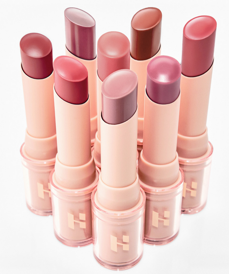 HOLIKA HOLIKA Glow Rise Balm : rouges à lèvres baume en tubes roses, marque sur fond blanc, visuel produit beauté.