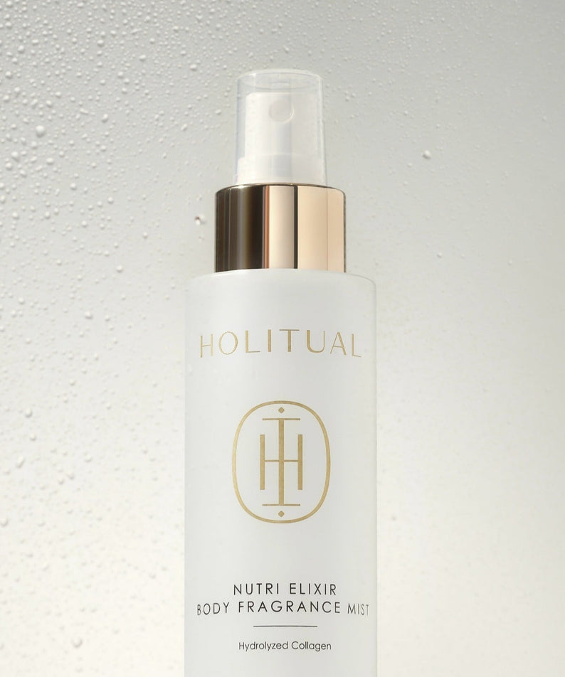 HOLITUAL Nutri Elixir Body Fragrance Mist 100ml de la marque HOLITUAL, flacon sur fond clair avec gouttelettes d’eau