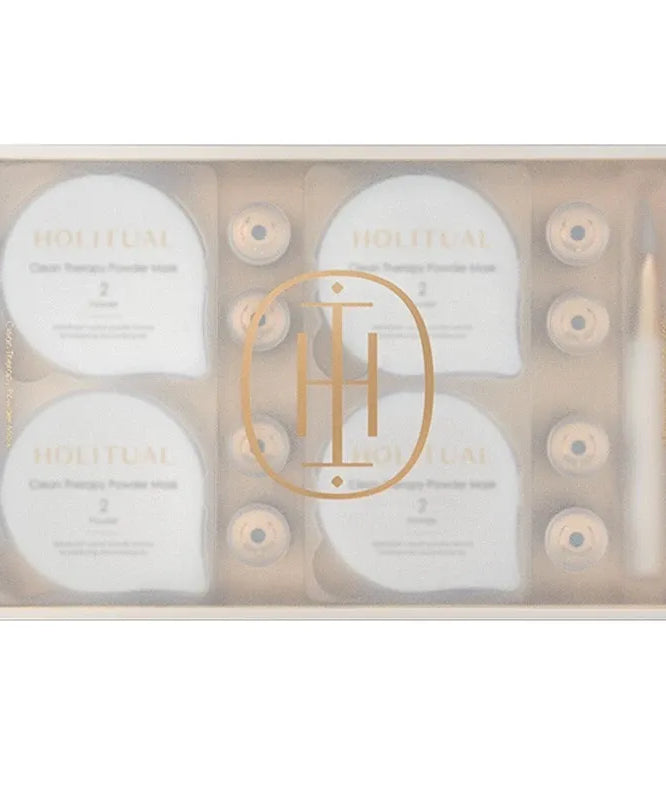 Boîte de masques en poudre HOLITUAL Clean Therapy avec logo doré, soin de beauté premium en français.