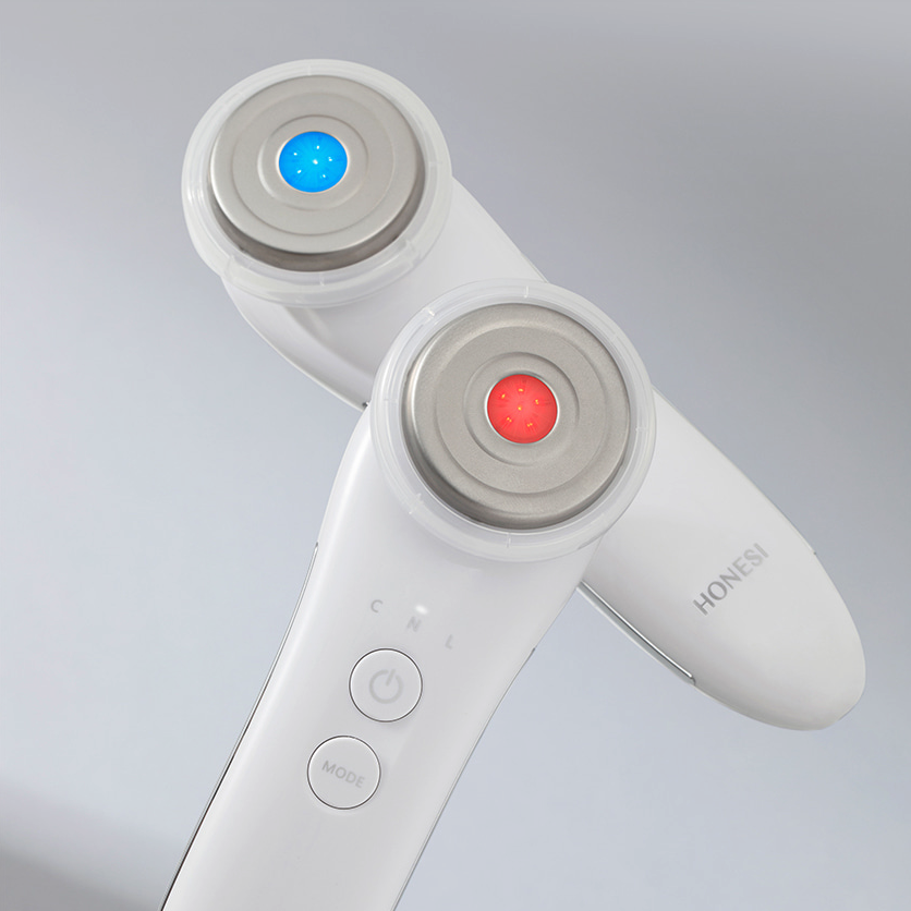 HONESI  EMS High Frequency Galvanic Home Care Massager, vue produit blanc avec LED bleue et rouge sur fond clair