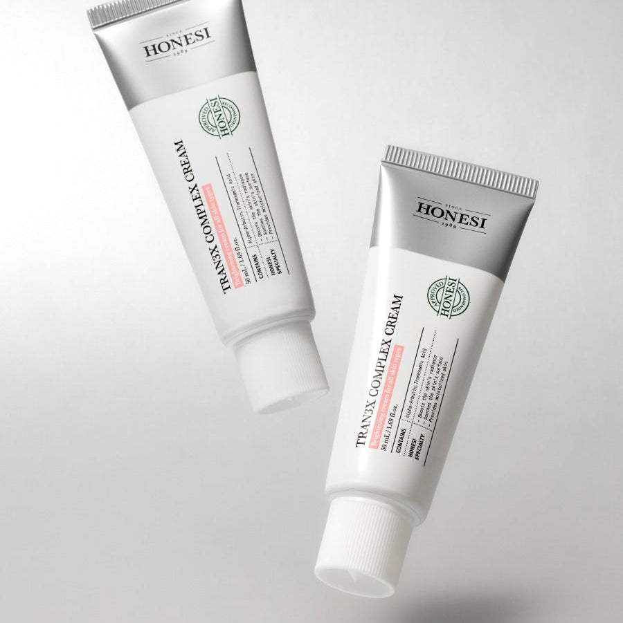 HONESI  Tranex Complex Cream 50ml, tube de crème cosmétique de la marque HONESI sur fond blanc.