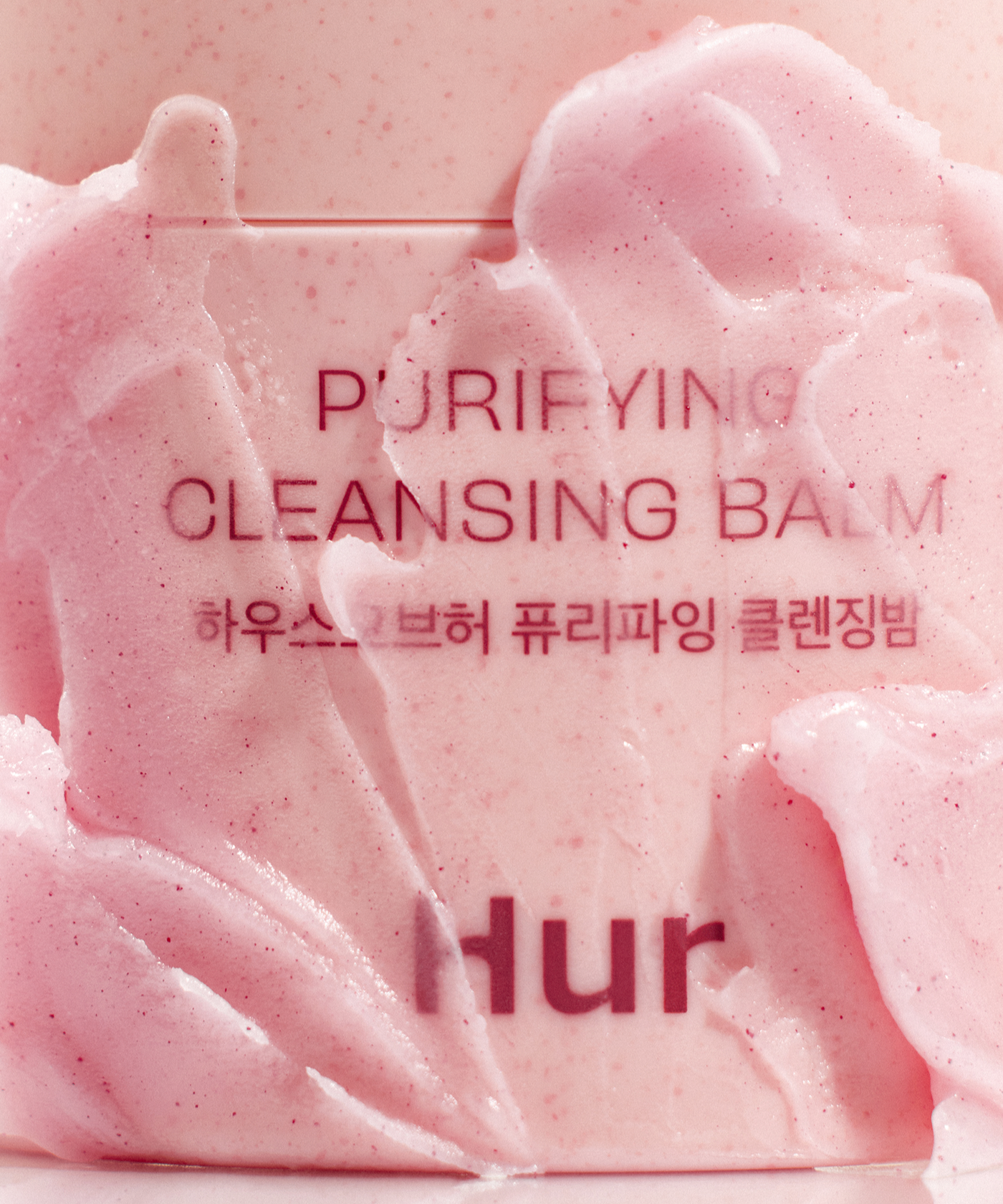 HOUSE OF HUR Purifying Cleansing Balm : baume nettoyant purifiant sur fond rose, texture mousse, visuel produit.