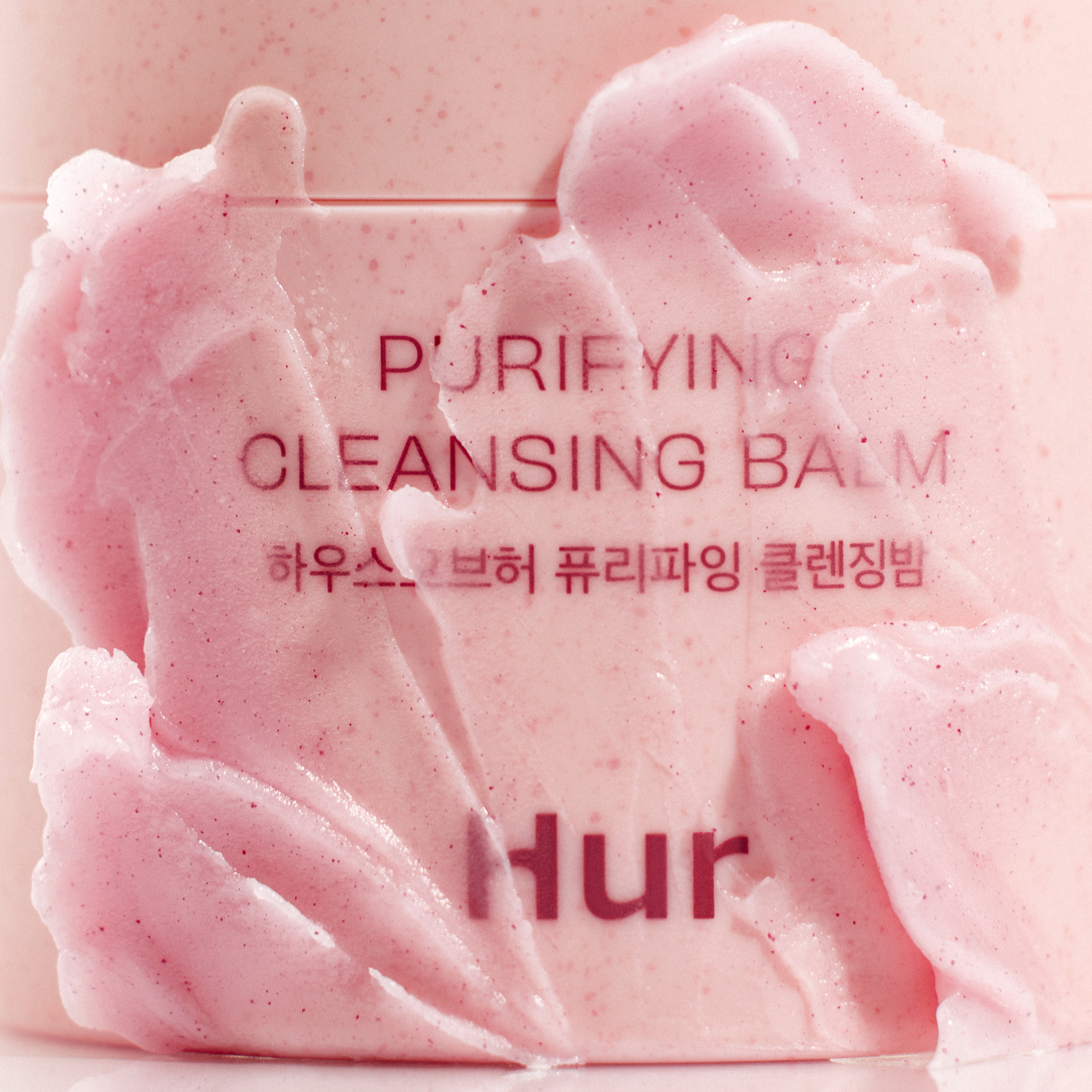 HOUSE OF HUR Purifying Cleansing Balm : baume nettoyant purifiant sur fond rose, texture mousse, visuel produit.