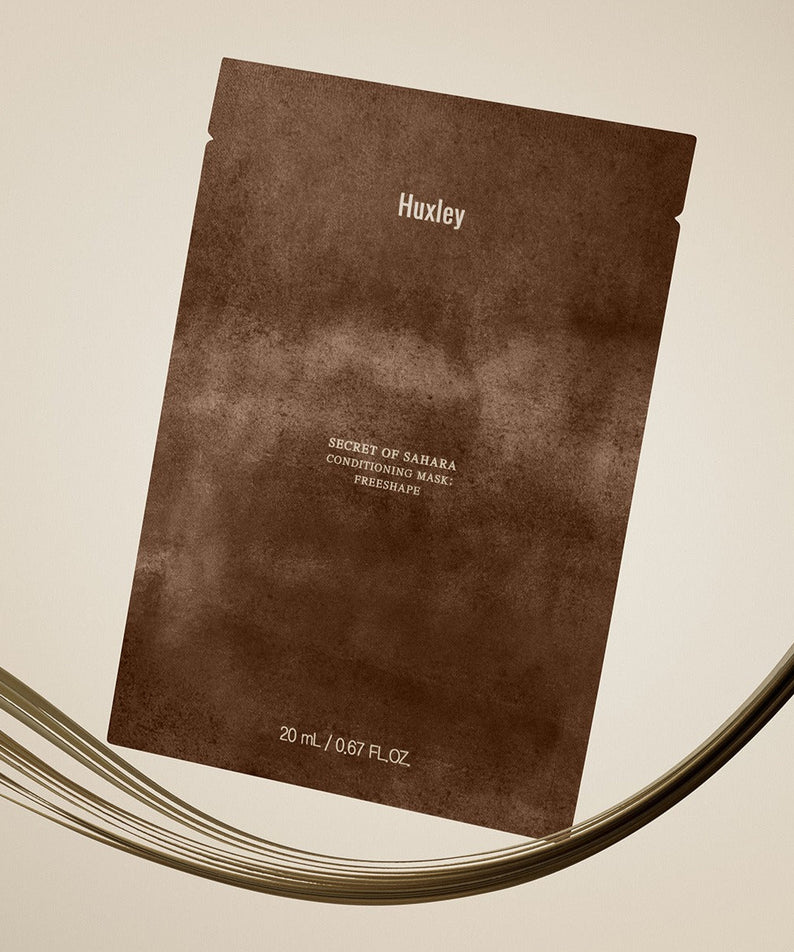 HUXLEY Conditioning Mask Freshape 20ml de Huxley : sachet brun sur fond clair, rendu visuel produit beauté.
