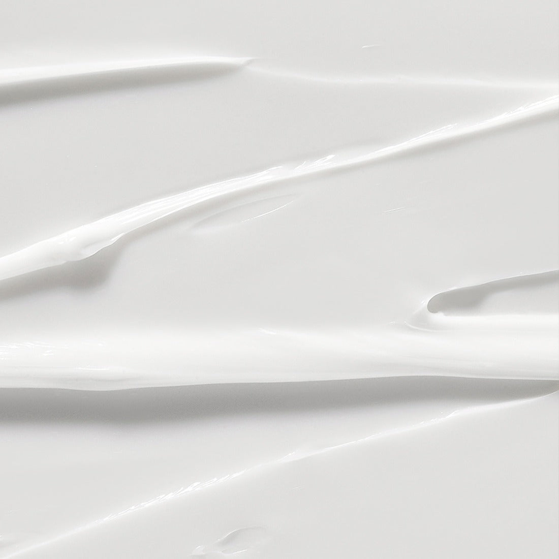Texture crème blanche et lisse — ILLIYOON Ultra Repair Intensive Care Cream 200ml, en gros plan, fond clair.