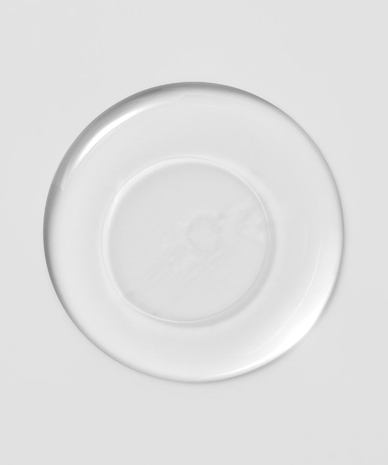 Texture du produit ILLIYOON Gentle Deep Lip & Eye Remover 140ml sur un fond blanc minimaliste.