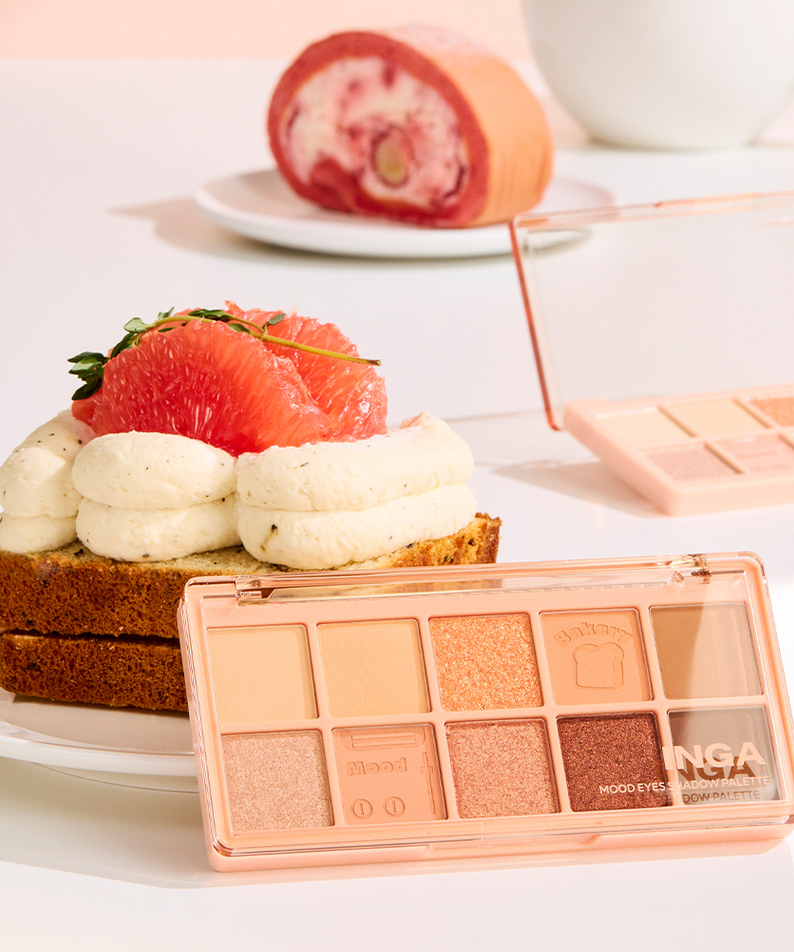 INGA Mood Eyes Shadow Palette de la marque INGA, maquillage sur fond pâtisserie, palette rose nude et fards brillants.
