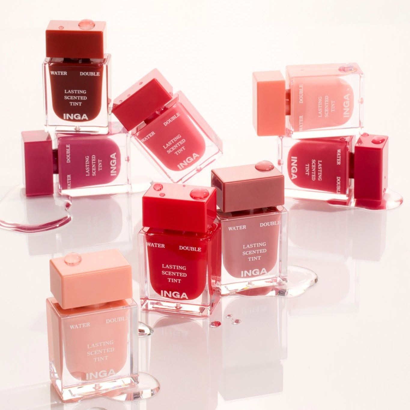 INGA Water Double Lasting Scented Tint 4.3g, marque INGA, vue produits rouges sur fond blanc, packaging brillant.