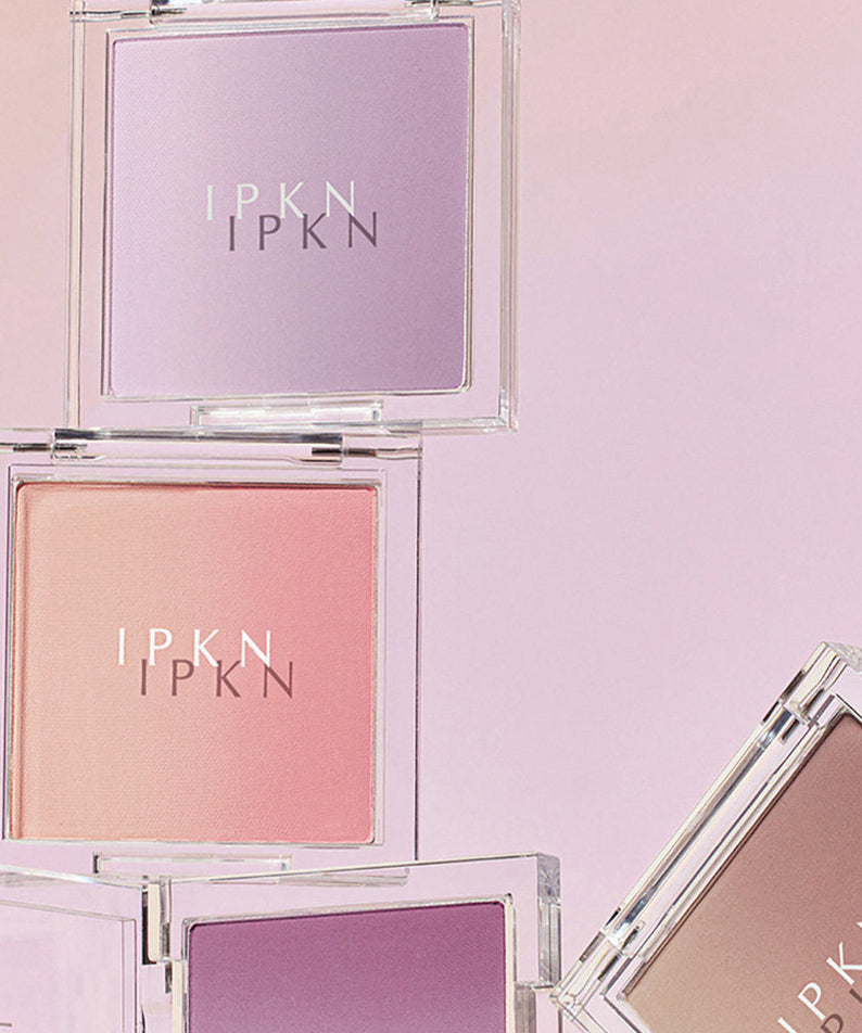 IPKN Personal Mood Layering Blusher 9.5g, palette de fards à joues superposables en nuances pastel rose, violet, et beige.
