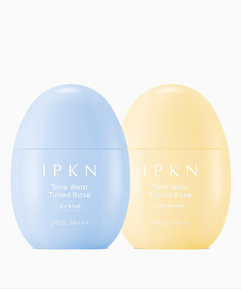 Deux flacons de IPKN Tone Wear Tinted Base en bleu glacé et citron doux, avec SPF35, idéals pour un teint uniforme et lumineux.