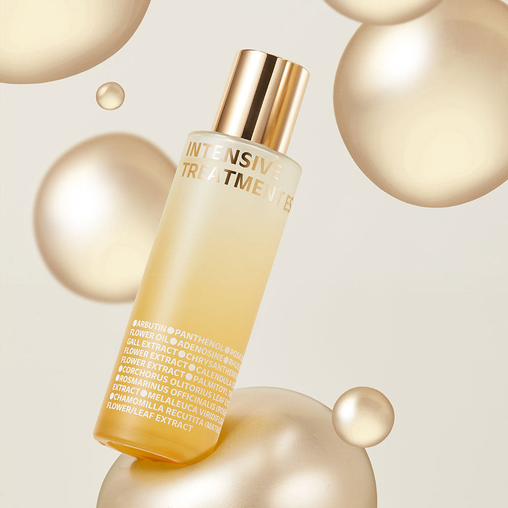 ISOI Intensive Treatment Essence 130ml, flacon doré sur fond beige avec bulles décoratives, produit de la marque ISOI.