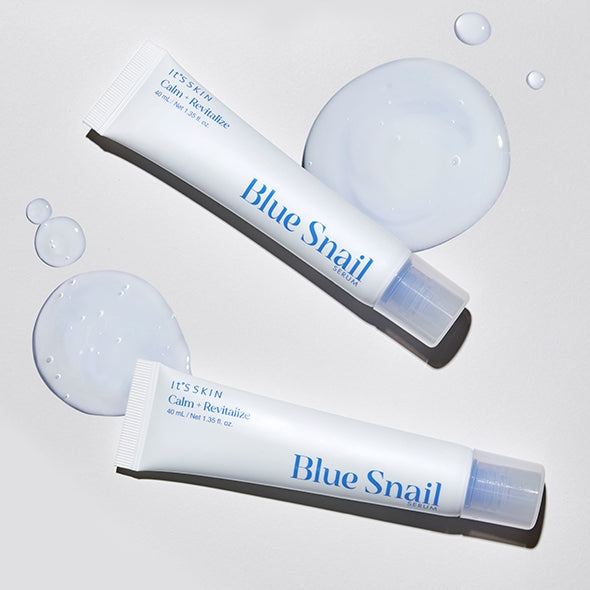 IT'S SKIN Blue Snail Serum 40ml de la marque IT'S SKIN, tubes et gouttes de gel bleu sur fond blanc