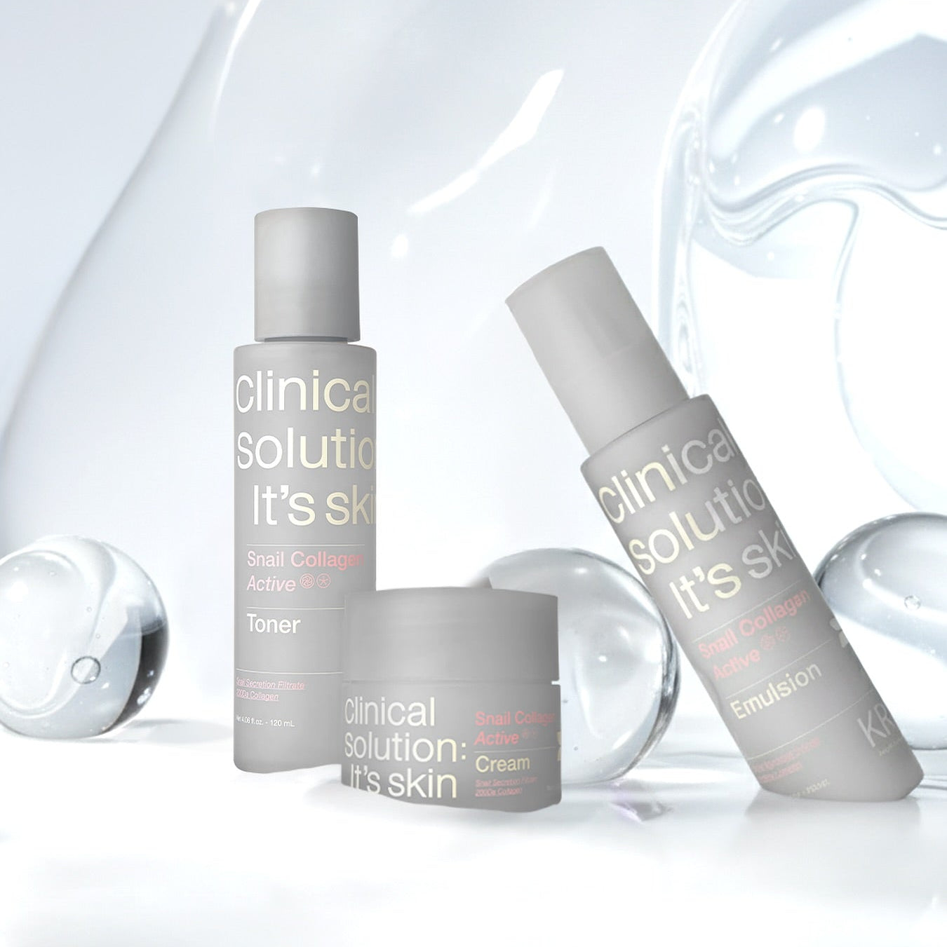 IT'S SKIN Snail Collagen Active Emulsion 120ml, marque It’s Skin, flacon au rendu cosmétique sur fond blanc et bulles