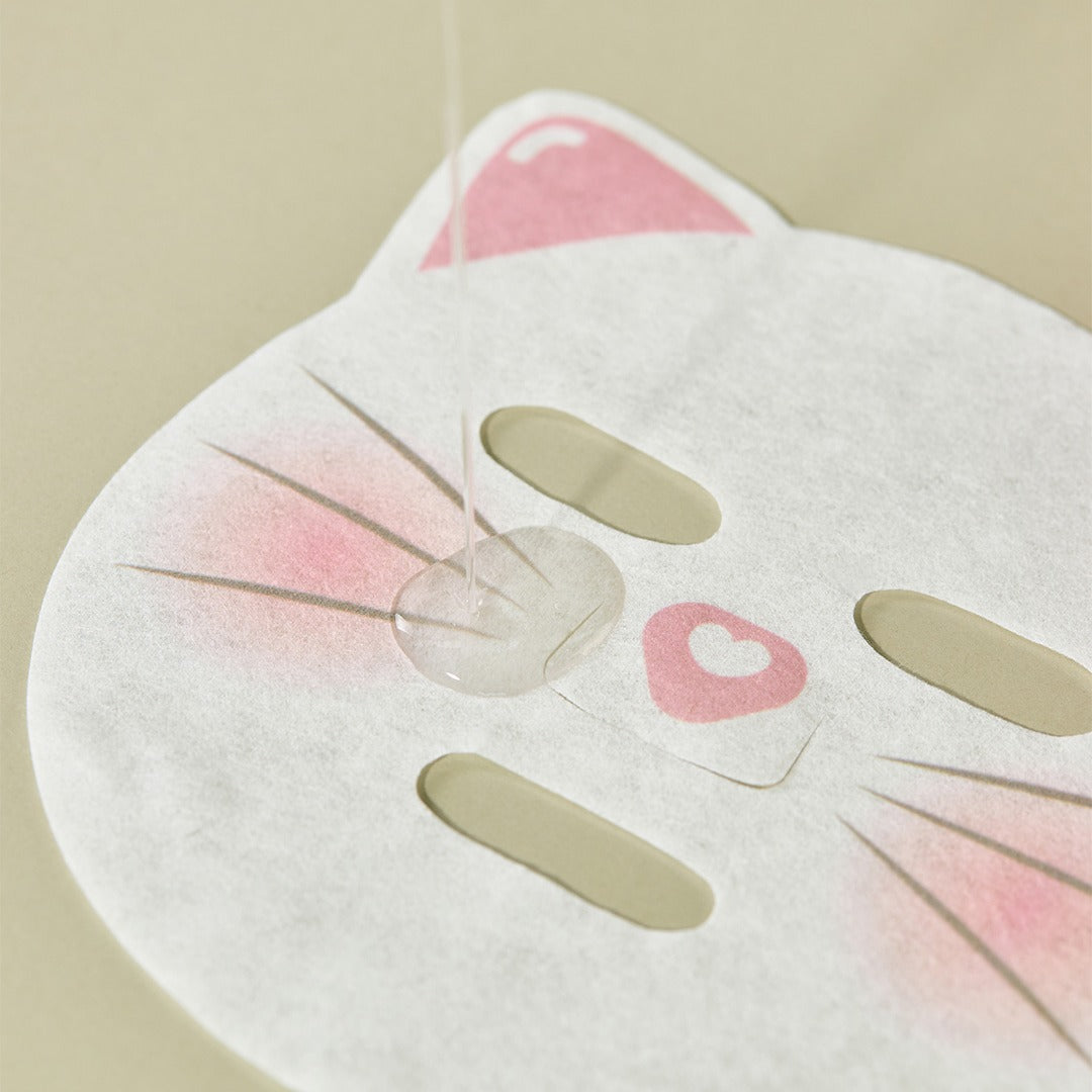 Décris l'image en français : IUNIK Centella Family Calming Mask for Kids (10 sheets) de la marque IUNIK, masque apaisant pour enfants.