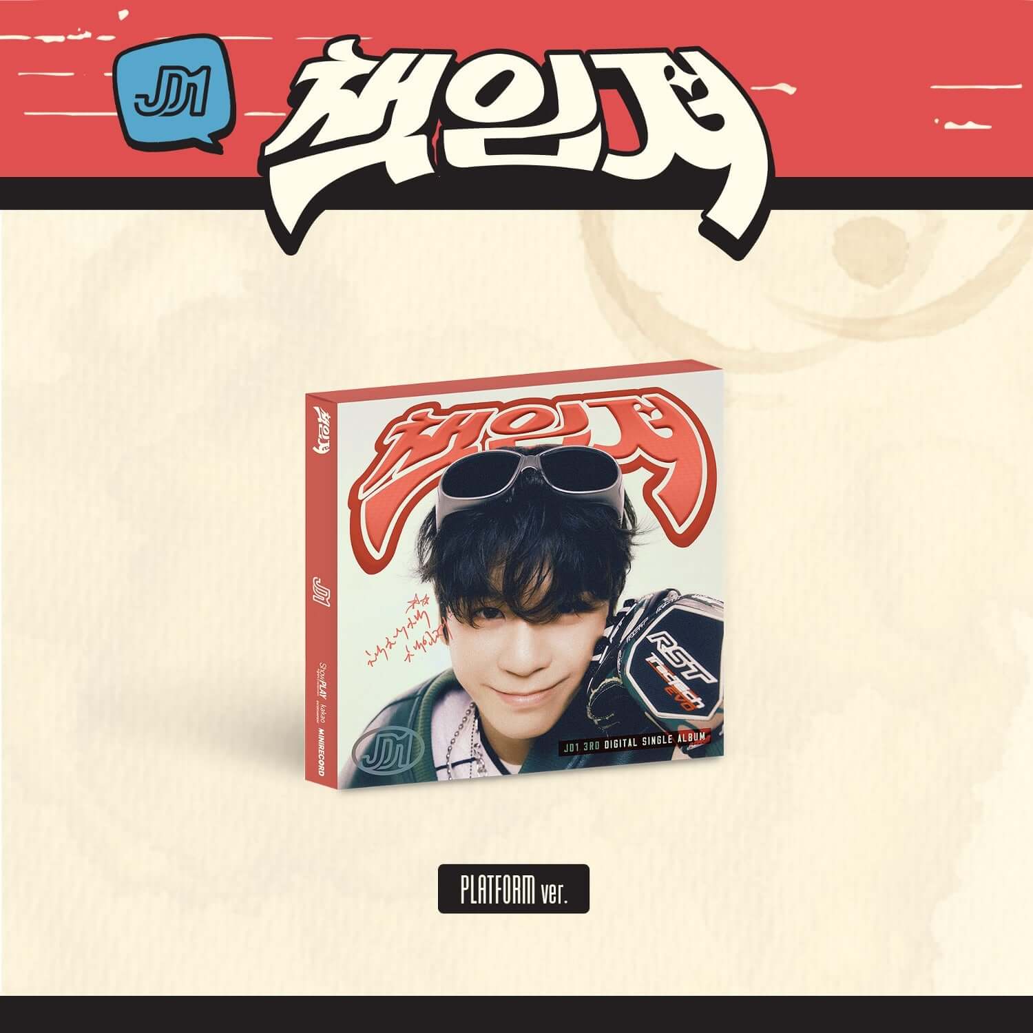 JD1 - (PLATFORM ver.) - Album Kpop, boîte officielle JD1 avec visuel rouge et portrait du membre sur fond beige.
