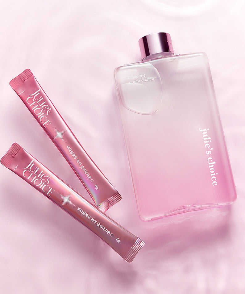 JULIE'S CHOICE Vita Glow High Glutathione C produit de beauté sur fond rose élégant.