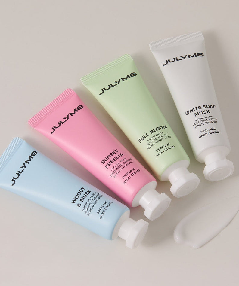 Crèmes pour les mains JULYME, y compris JULYME Perfume Shea Butter Hand Cream 30ml, montrées en quatre variations colorées.