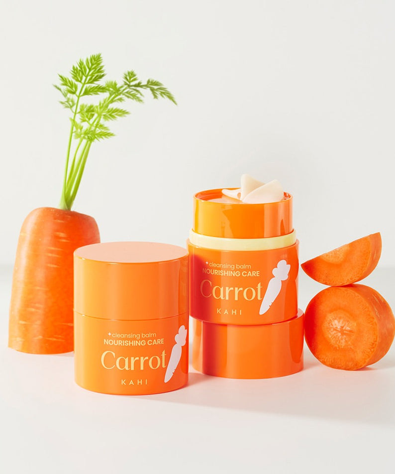 KAHI Cleansing Balm 3 Types 50ml en pot orange avec carottes fraîches.