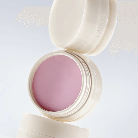 LADOR Body Multi Balm 30g de LADOR, baume corporel en pot ouvert sur fond clair, texture rose visible.