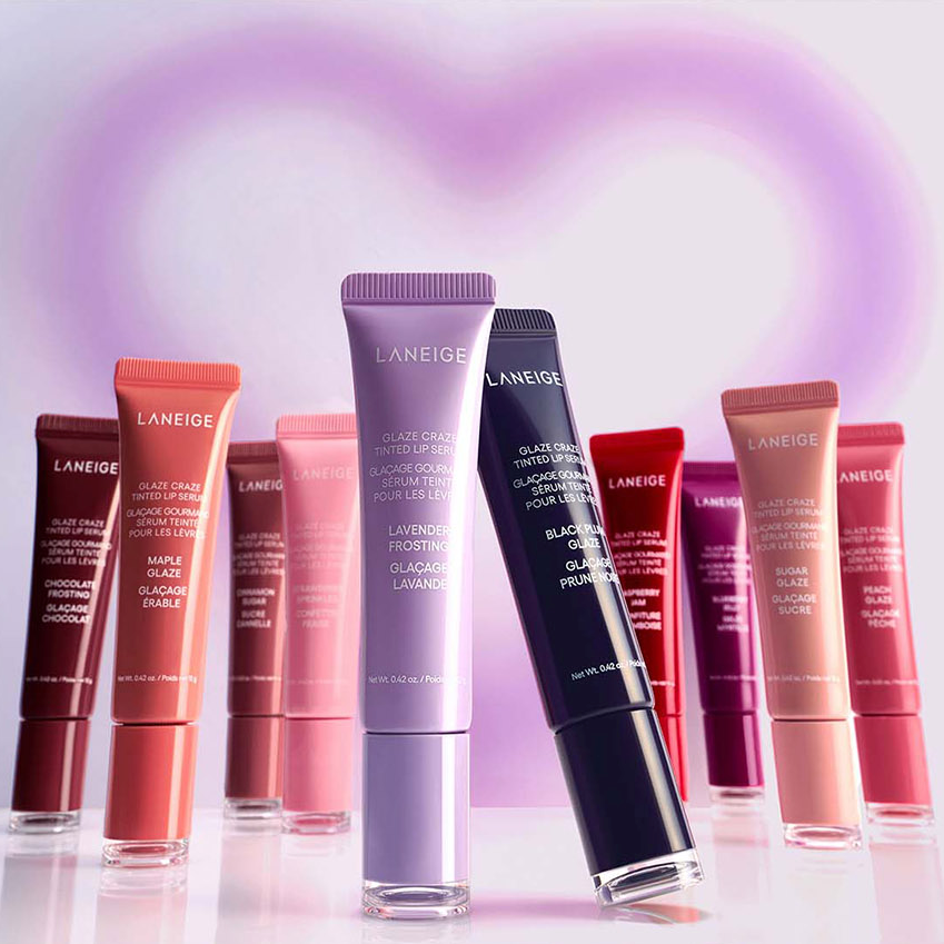 LANEIGE Glaze Craze Tinted Lip Serum, tubes lumineux en dégradé violet et rose sur fond pastel, marque LANEIGE