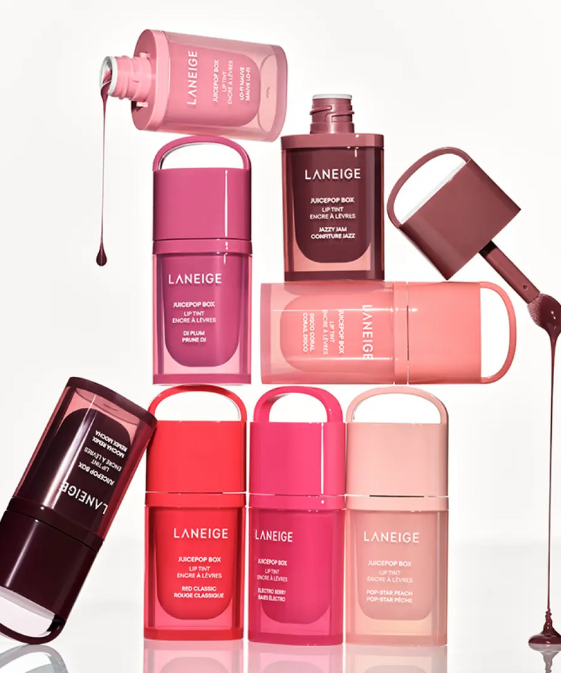 Décris l'image en français : LANEIGE Juice Pop Box Lip Tint 4.5g, coffret de lip tint roses, marque sur flacons, fond blanc.