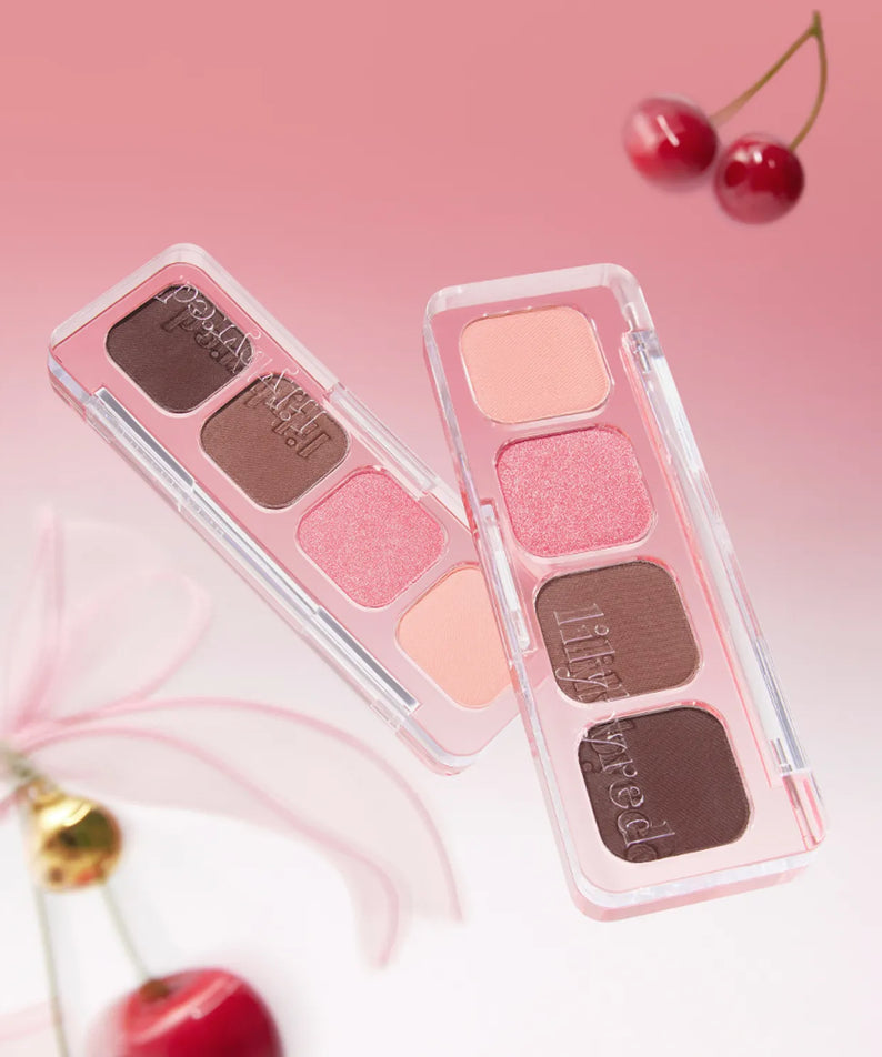 LILYBYRED Mood It Palette de la marque, étui maquillage avec fards roses et bordeaux sur fond rose pastel.
