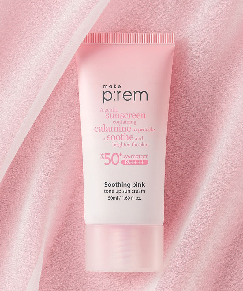 MAKE P:REM  Soothing Pink Tone-Up Sunscreen SPF 50+ PA++++ 50ml, tube sur fond rose, marque visible, peau apaisée.