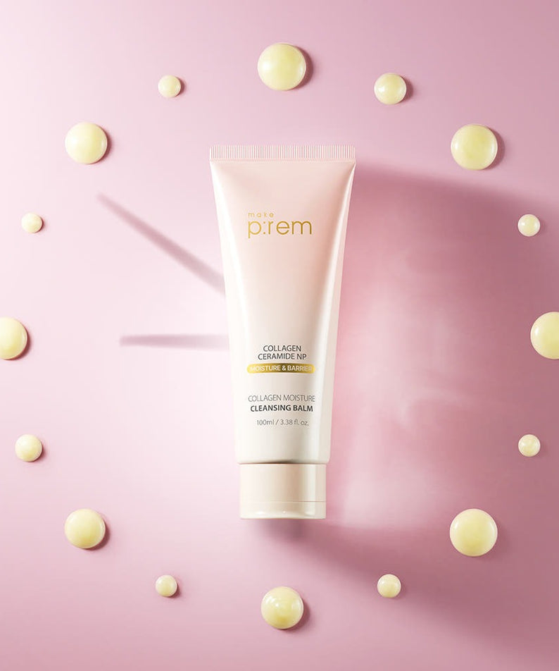 MAKE P:REM Collagen Moisture Cleansing Balm 100ml sur fond rose avec gouttes de baume crème