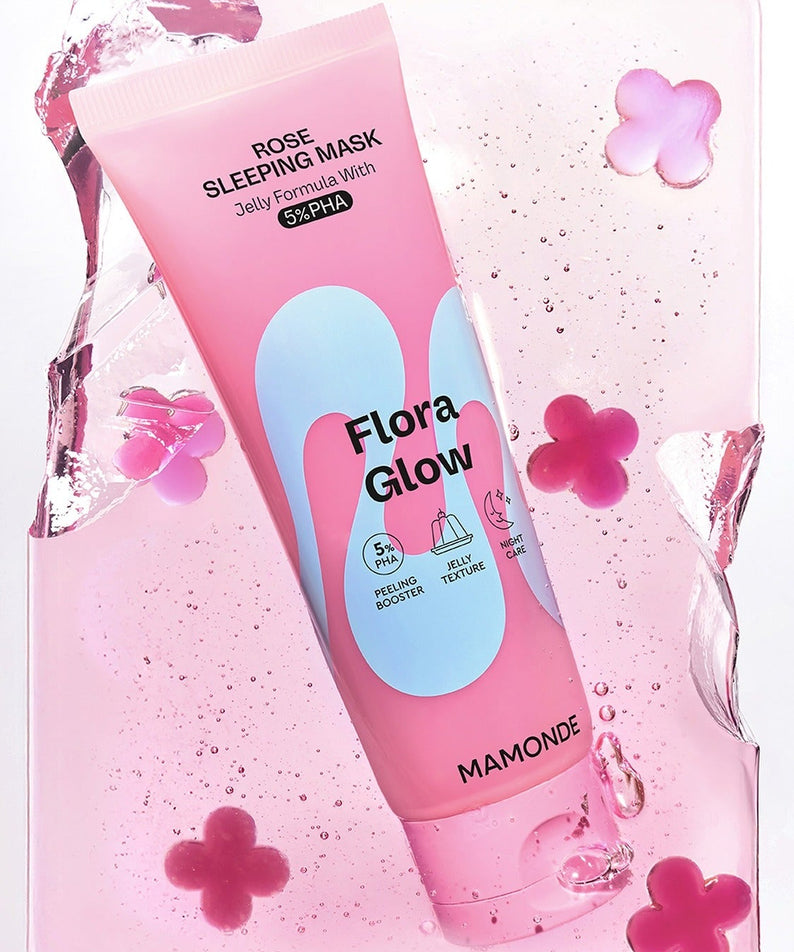 MAMONDE Flora Glow Rose Sleeping Mask 80ml de la marque MAMONDE, sur fond rose floral avec gouttes et fleurs.