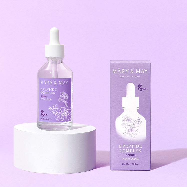 MARY&MAY 6 Peptide Complex Serum 80ml : flacon et boîte sur fond violet, produit skincare beauté en contexte studio