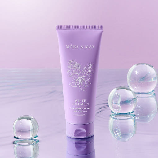 MARY&MAY White Collagen Cleansing Foam 150ml, tube violet sur fond rose, bulles décoratives, produit de la marque.