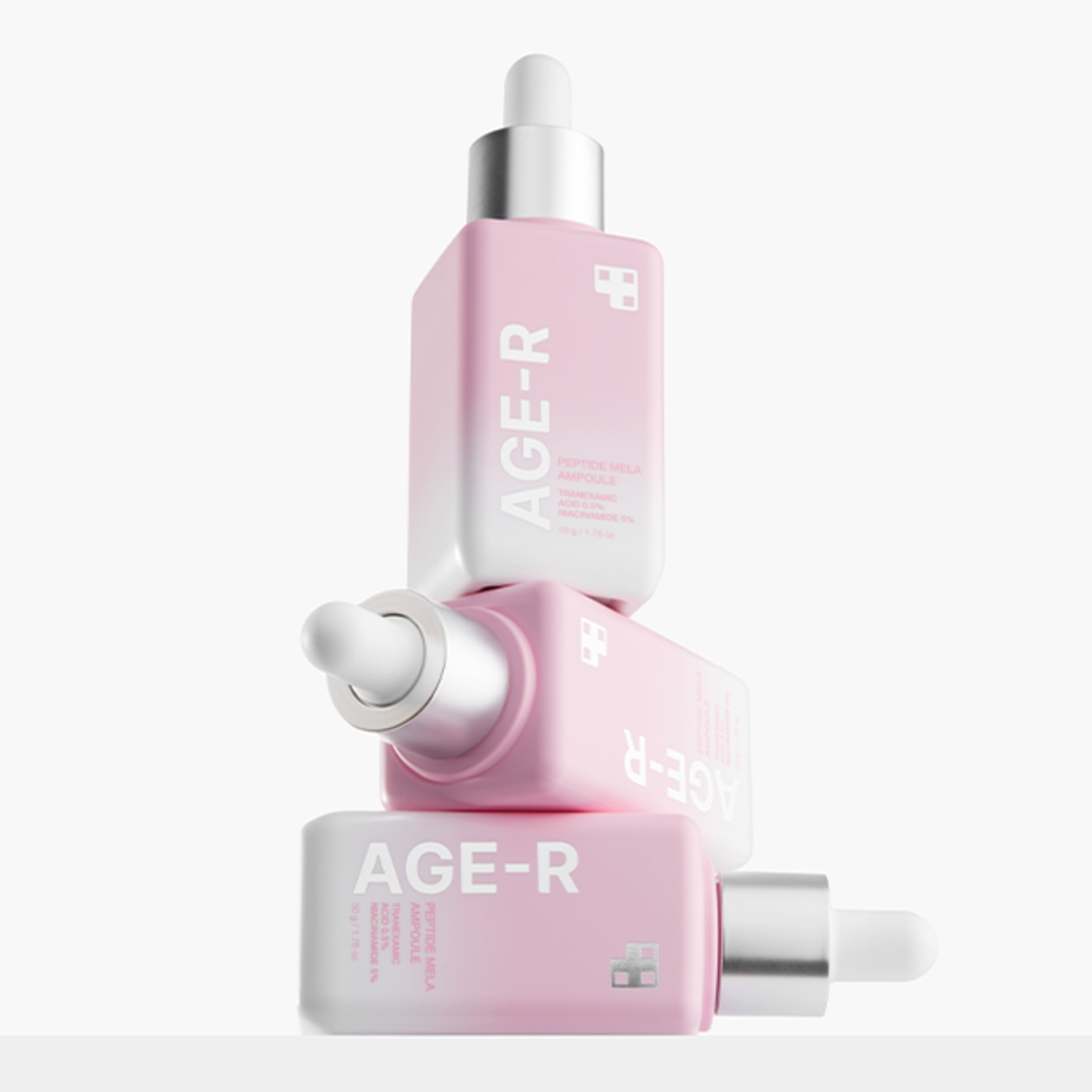 MEDICUBE AGE-R Peptide Mela Ampoule 50g de la marque MEDICUBE, flacon rose sur fond blanc, goutte-pipette