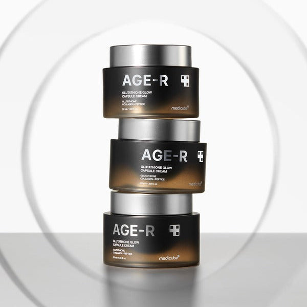 MEDICUBE AgeR Glutathione Glow Capsule Cream de marque MEDICUBE, pots cosmétiques alignés sur fond clair, style produit.